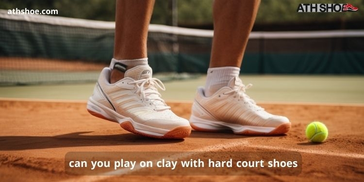 A picture showing a man on a tennis court talking about can you play on clay with hard court shoes